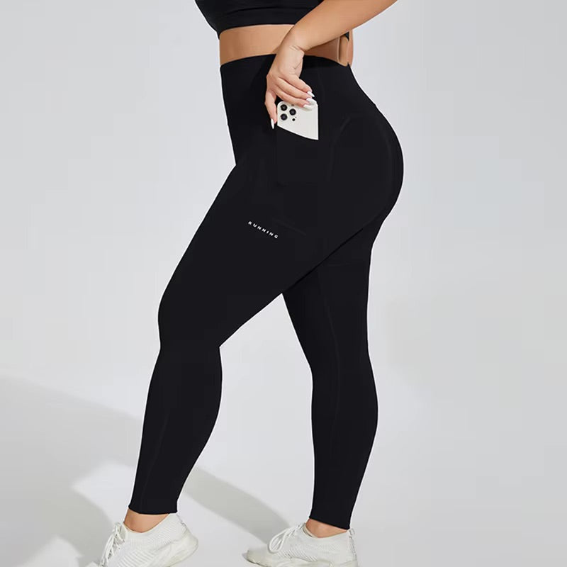 Woman posing in black leggings