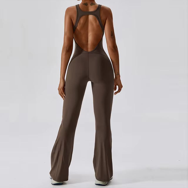 Woman posing in a brown yoga jumpsuit