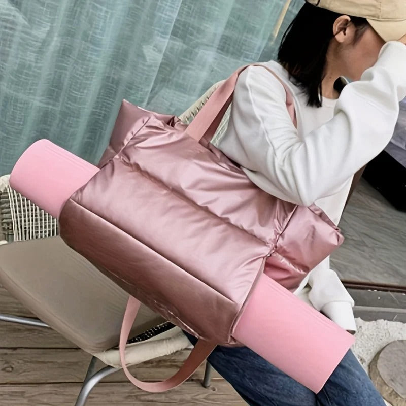 Woman carrying a pink multipurpose yoga & fitness tote bag