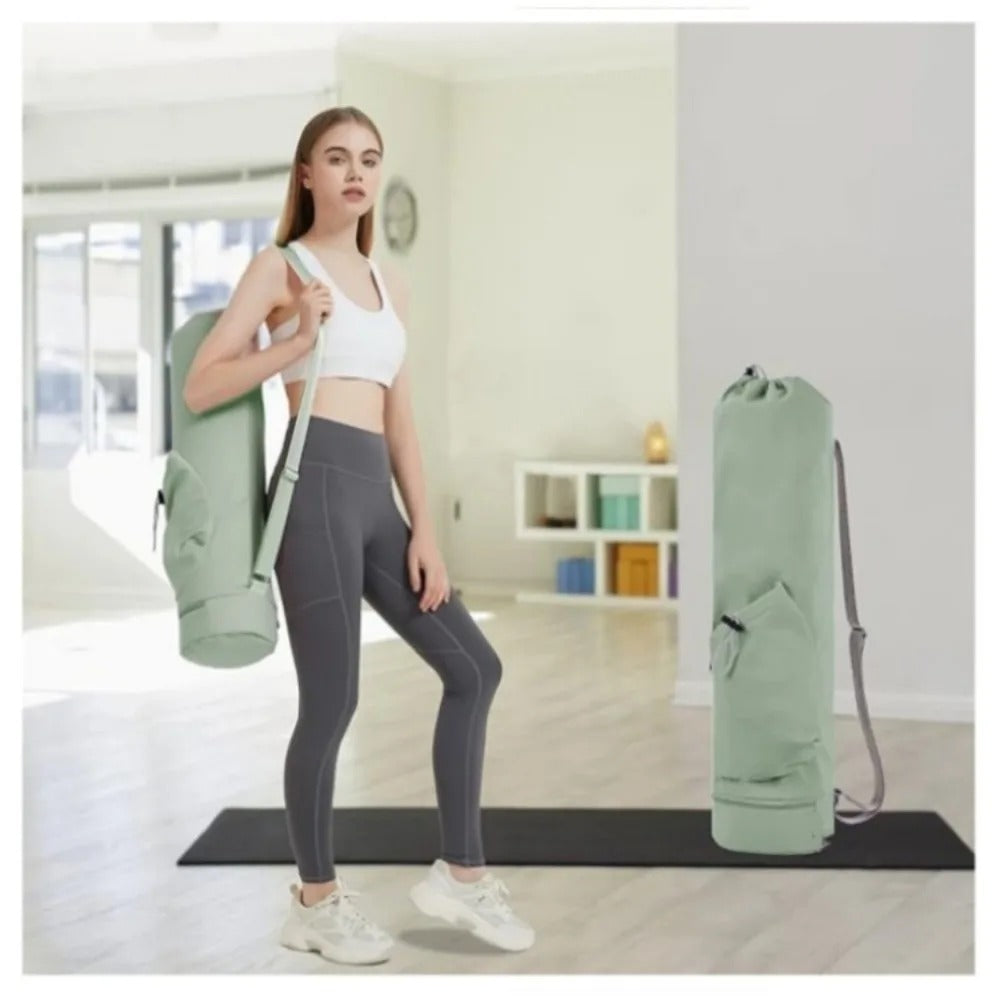 Woman carrying an olive green yoga mat bag 