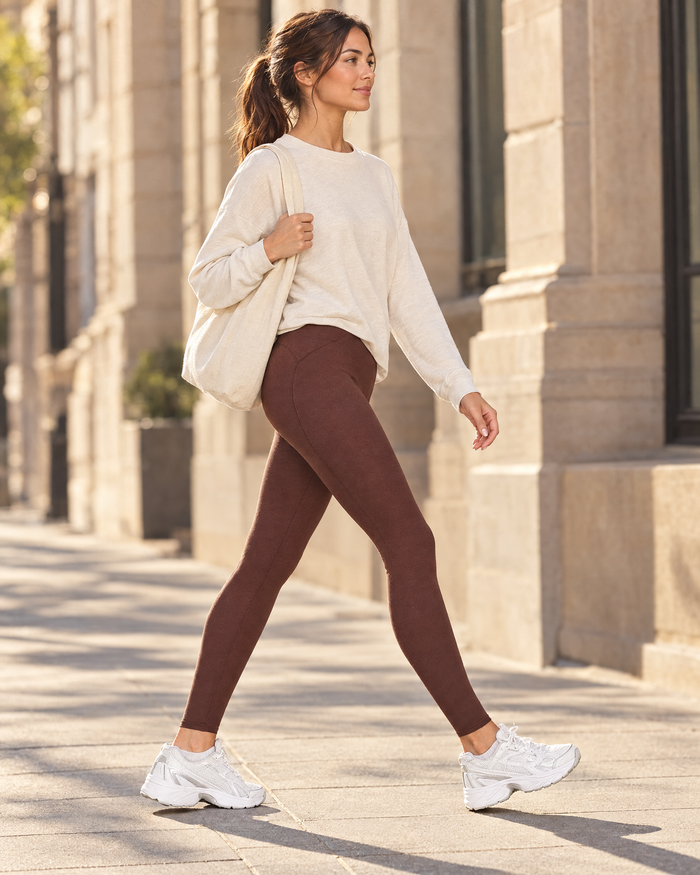 Woman walking in mocha high-waist leggings